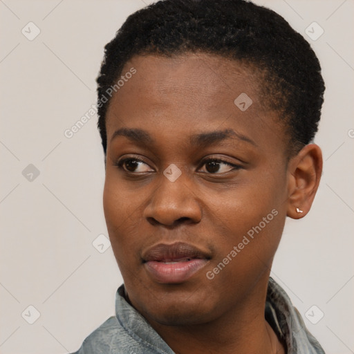 Joyful black young-adult female with short  black hair and brown eyes