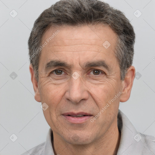 Joyful white middle-aged male with short  brown hair and brown eyes