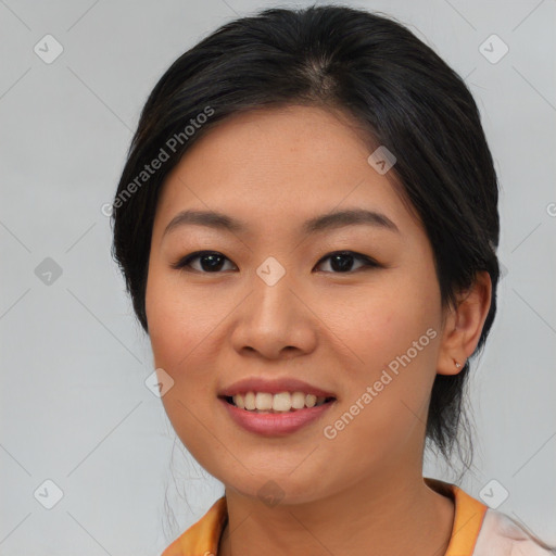 Joyful asian young-adult female with medium  black hair and brown eyes