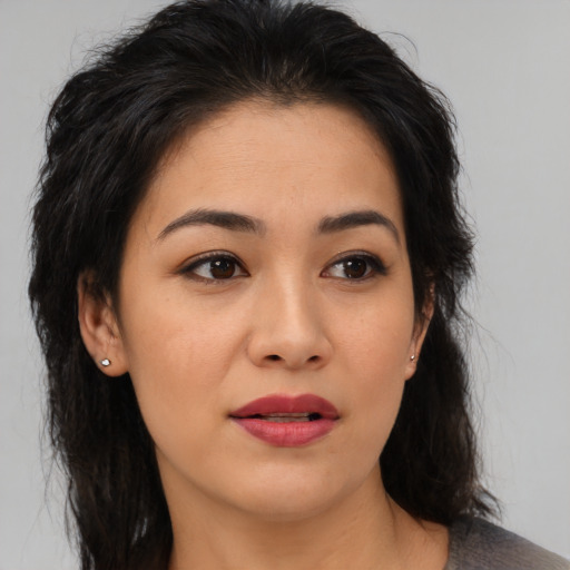 Neutral asian young-adult female with medium  brown hair and brown eyes