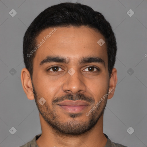 Joyful latino young-adult male with short  brown hair and brown eyes