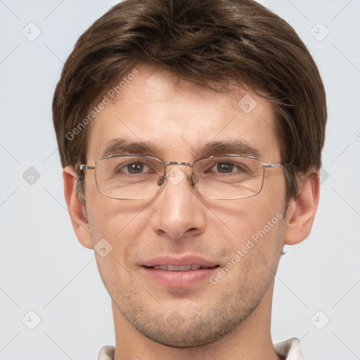 Joyful white adult male with short  brown hair and grey eyes