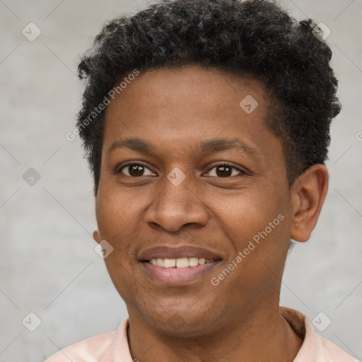 Joyful latino young-adult male with short  brown hair and brown eyes