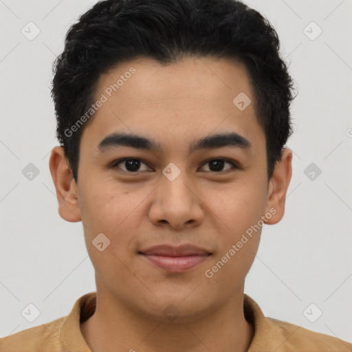 Joyful latino young-adult male with short  brown hair and brown eyes