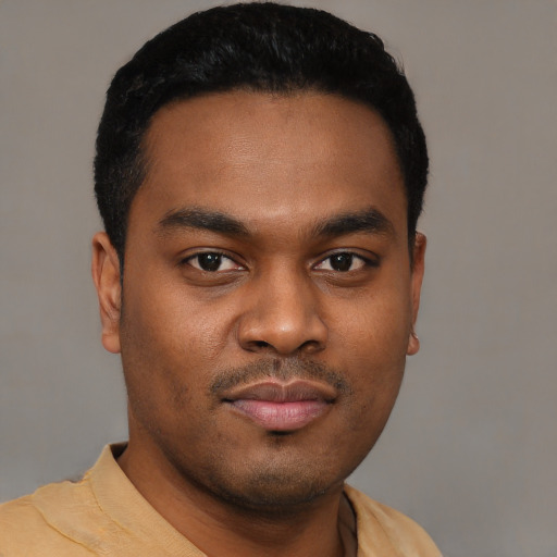 Neutral black young-adult male with short  black hair and brown eyes