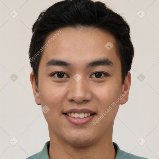 Joyful white young-adult male with short  black hair and brown eyes