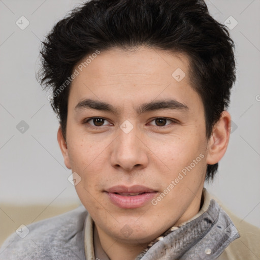 Joyful latino young-adult male with short  brown hair and brown eyes