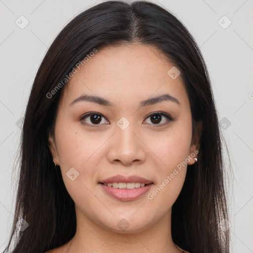 Joyful asian young-adult female with long  brown hair and brown eyes