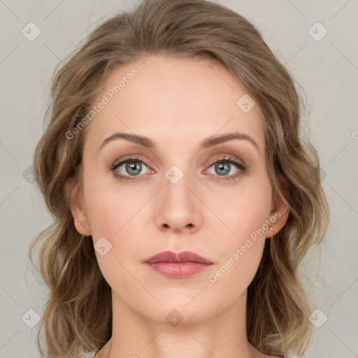 Neutral white young-adult female with medium  brown hair and green eyes