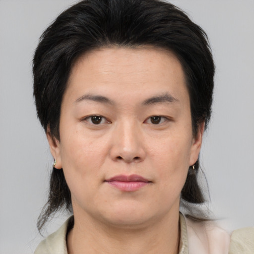 Neutral asian young-adult female with medium  brown hair and brown eyes