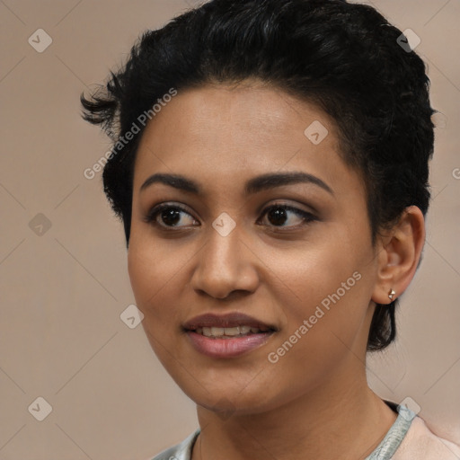 Joyful latino young-adult female with short  black hair and brown eyes