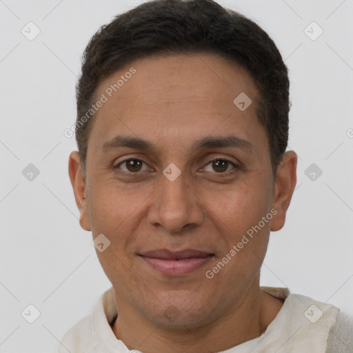 Joyful white adult male with short  brown hair and brown eyes