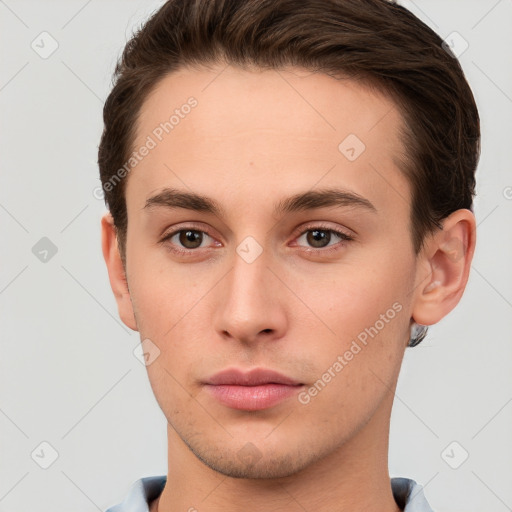 Neutral white young-adult male with short  brown hair and grey eyes