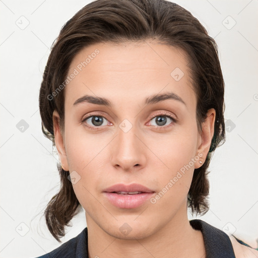 Neutral white young-adult female with medium  brown hair and brown eyes