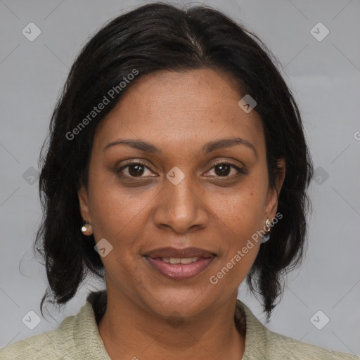 Joyful black adult female with medium  brown hair and brown eyes