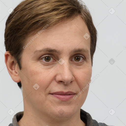 Joyful white adult female with short  brown hair and grey eyes