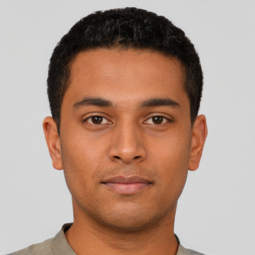 Neutral latino young-adult male with short  brown hair and brown eyes