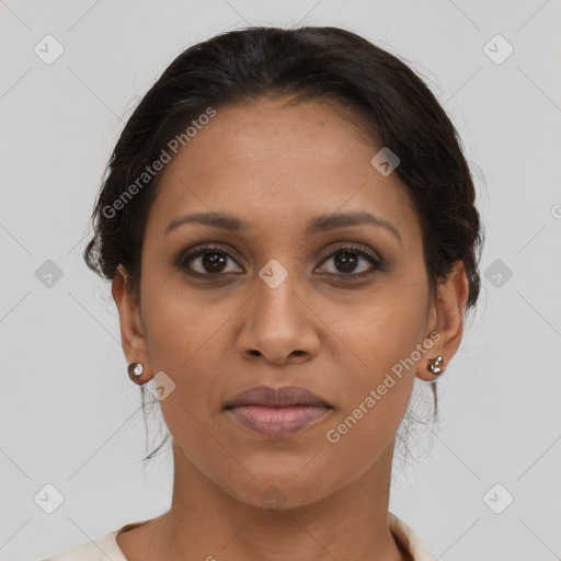 Joyful latino young-adult female with medium  brown hair and brown eyes