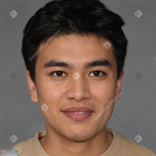 Joyful asian young-adult male with short  brown hair and brown eyes