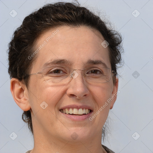 Joyful white adult female with short  brown hair and brown eyes