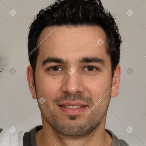 Joyful white young-adult male with short  black hair and brown eyes