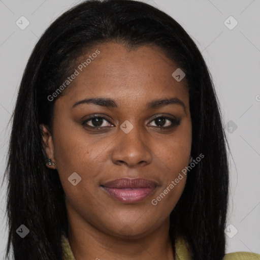 Joyful black young-adult female with long  brown hair and brown eyes