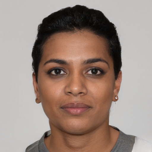 Neutral black young-adult female with short  black hair and brown eyes