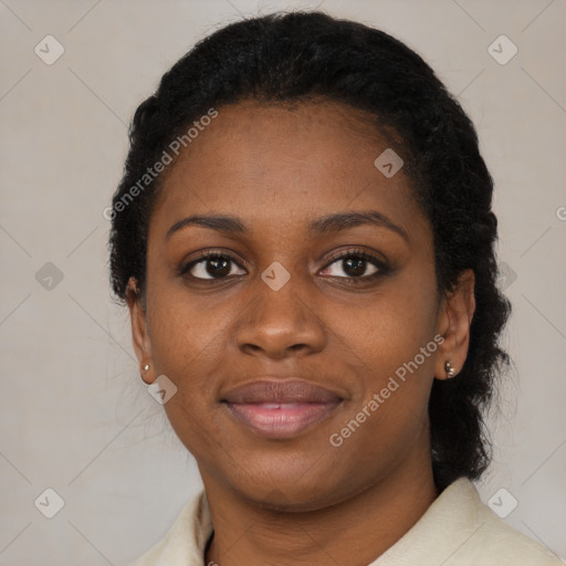 Joyful black young-adult female with medium  black hair and brown eyes