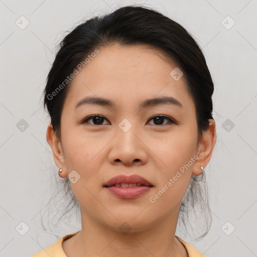 Joyful asian young-adult female with medium  brown hair and brown eyes