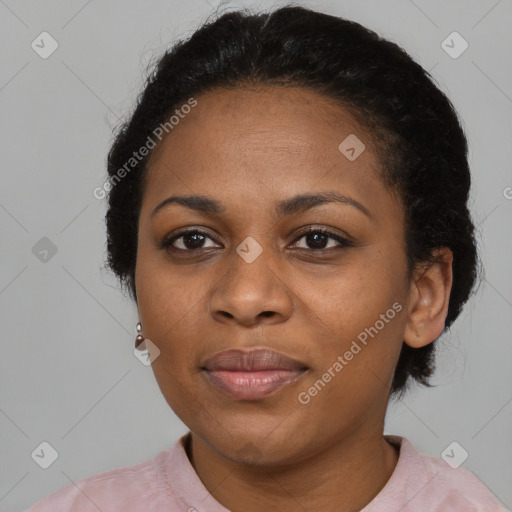 Joyful black young-adult female with medium  black hair and brown eyes