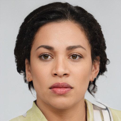 Neutral latino young-adult female with medium  brown hair and brown eyes