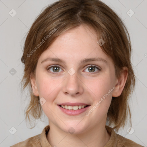 Joyful white young-adult female with medium  brown hair and blue eyes