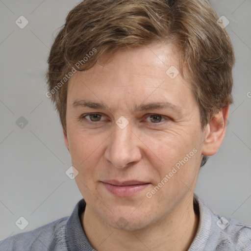 Joyful white adult male with short  brown hair and grey eyes