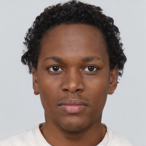 Neutral black young-adult female with short  brown hair and brown eyes