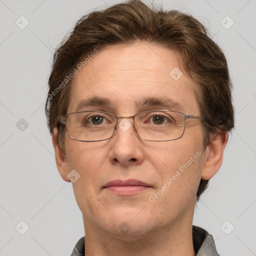 Joyful white adult male with short  brown hair and grey eyes