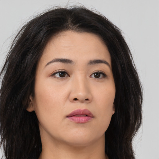 Neutral asian young-adult female with long  brown hair and brown eyes
