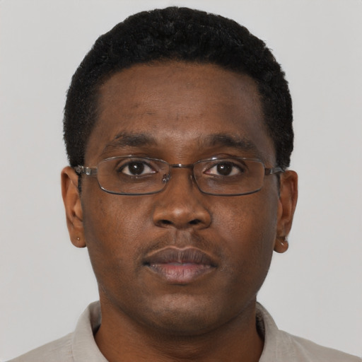 Neutral black young-adult male with short  brown hair and brown eyes