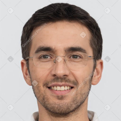 Joyful white adult male with short  brown hair and brown eyes