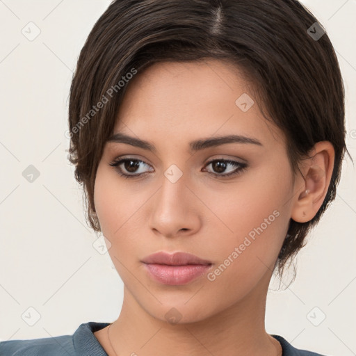 Neutral white young-adult female with medium  brown hair and brown eyes