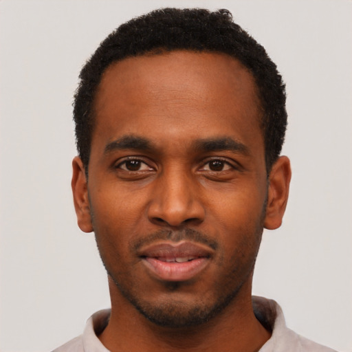 Neutral black young-adult male with short  black hair and brown eyes