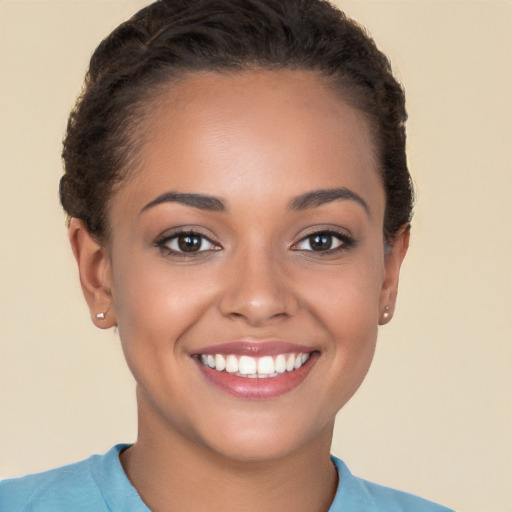 Joyful white young-adult female with short  brown hair and brown eyes