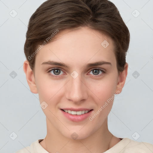 Joyful white young-adult female with short  brown hair and brown eyes