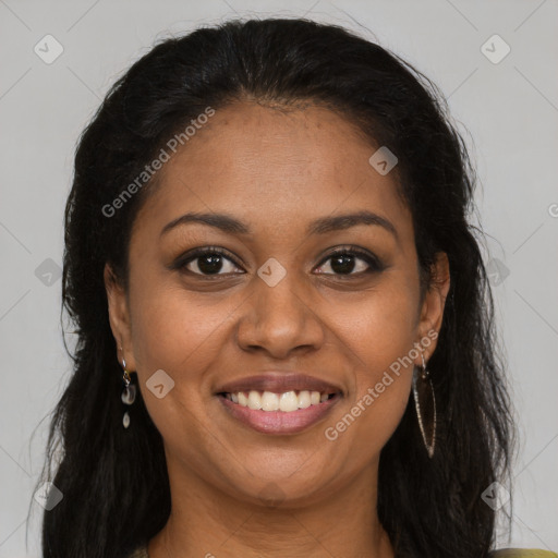 Joyful black young-adult female with long  brown hair and brown eyes