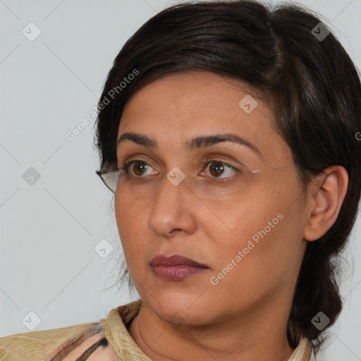 Neutral white adult female with medium  brown hair and brown eyes