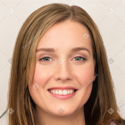 Joyful white young-adult female with long  brown hair and green eyes