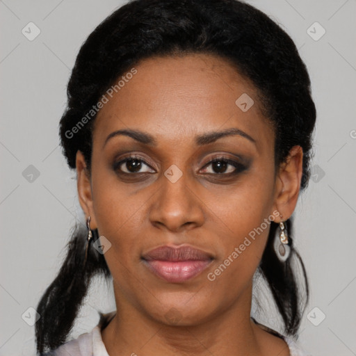 Joyful latino young-adult female with medium  black hair and brown eyes