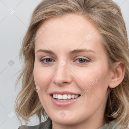 Joyful white young-adult female with medium  brown hair and blue eyes