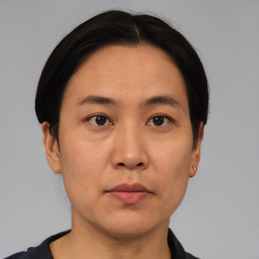 Neutral asian young-adult male with short  black hair and brown eyes