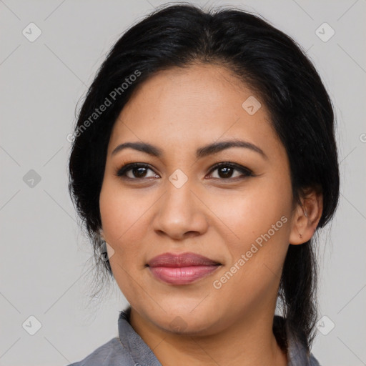 Joyful latino young-adult female with medium  black hair and brown eyes