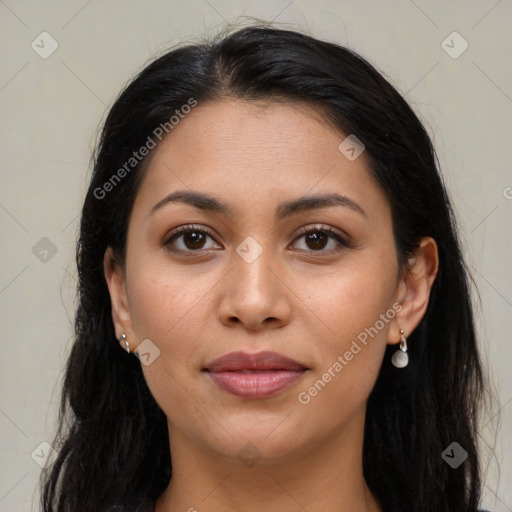 Joyful latino young-adult female with long  brown hair and brown eyes